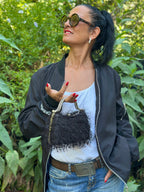 BlackWhisper – Schwarze Handtasche mit Strassbügel